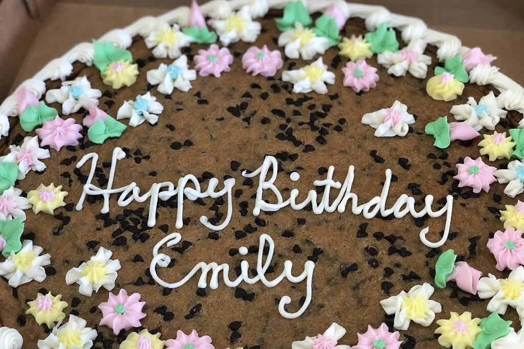 Cookie Cake, Our famous chocolate-chip cookie cake, decorated to order.